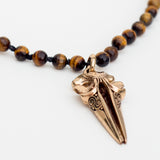 Harad Hand knotted faceted Tiger Eye with brass skull Necklace
