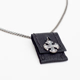 Adrak Black hand sewn leather pouch and silver Cross Necklace