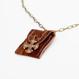 Amchoor Cognac colored hand sewn leather pouch and silver Cross Necklace